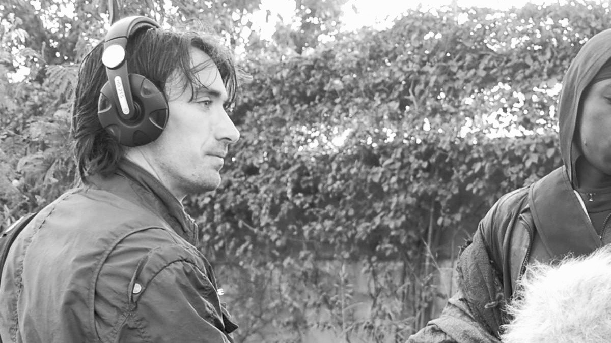 Brian Kenny recording with headphones